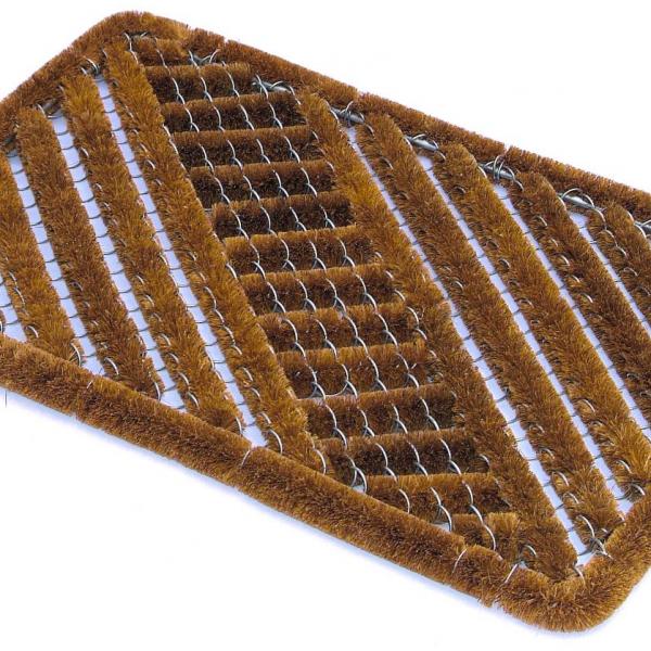 the bottle brush mat shows coir fibres mounted onto aluminium frame that scrapes shoes hard and traps dirt to keep floors clean.