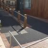 Non slip matting is fitted onto a school ramp. The Safety Tread Ultra Grip is black on a wooden decked ramp.
