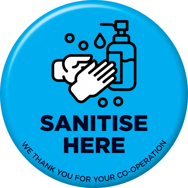 A blue Floor Sticker reads "Sanitise Here". It shows two hands sanitising themselves.